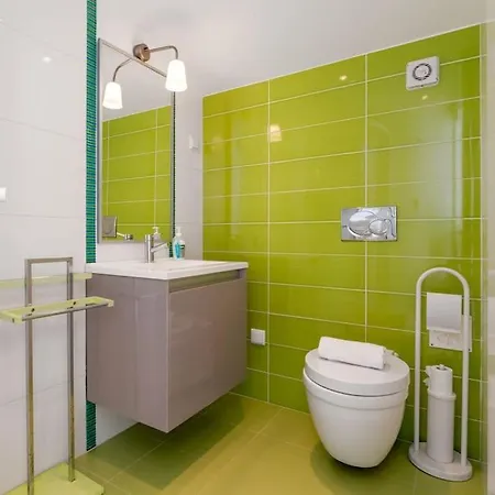 Апартаменты Sunset Terrace - Beachfront With Private Parking Назаре